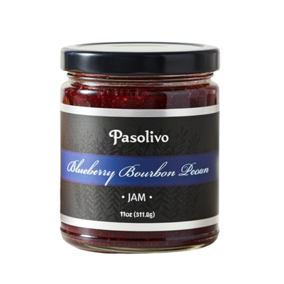 Jar of Pasolivo Blueberry Bourbon Pecan Jam on a white background