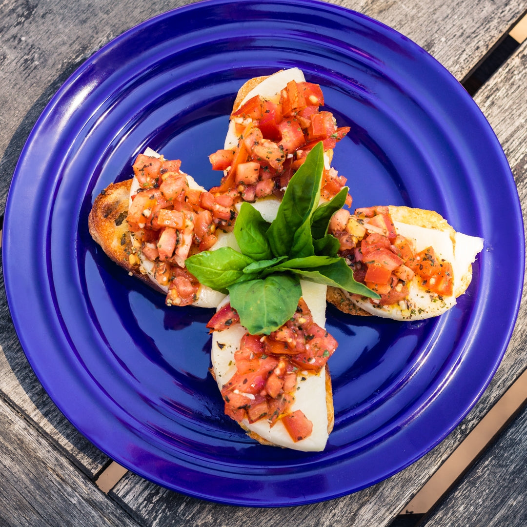 Pasolivo Grilled Bruschetta with Mozzarella recipe on a blue dish